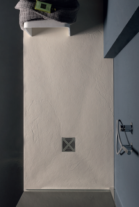 Piatto doccia rettangolare in marmo resina riducibile h.3cm crema con piletta di scarico
